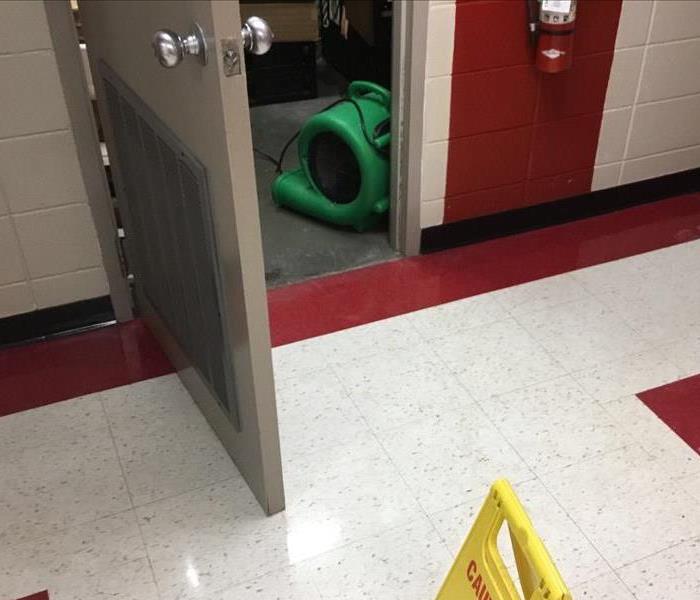 Drying equipment on floor.