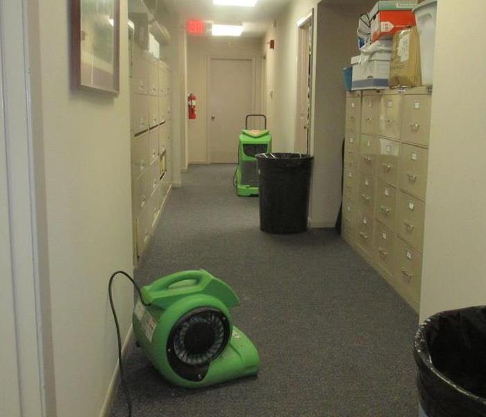 Drying equipment on floor.