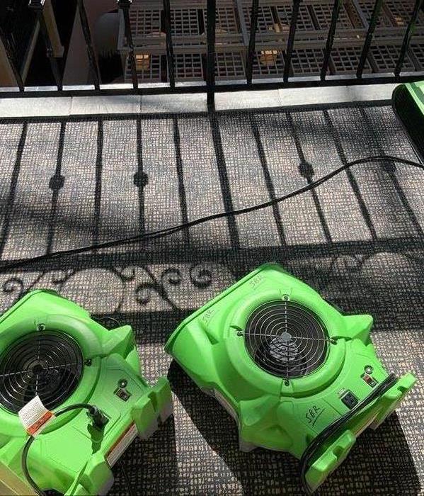 Drying equipment - air movers - on floor.