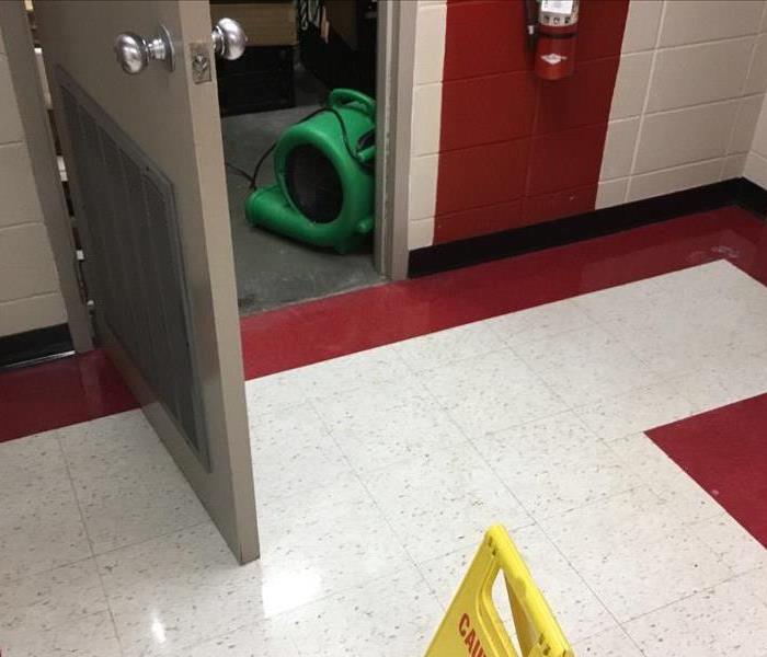 Drying equipment on floor.