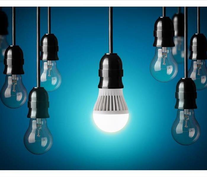 LED bulb and simple light bulbs.Blue background